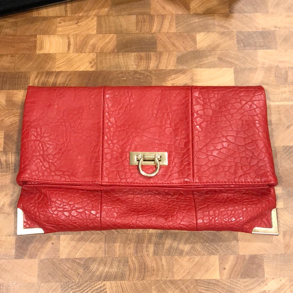 Red faux leather clutch